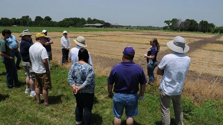 K-State Research and Extension professionals tour the John C. Pair Horticulture Center in this file photo. The center had been slated for closure, but after a process to determine methods for ensuring its self-sustainability, it remains open.