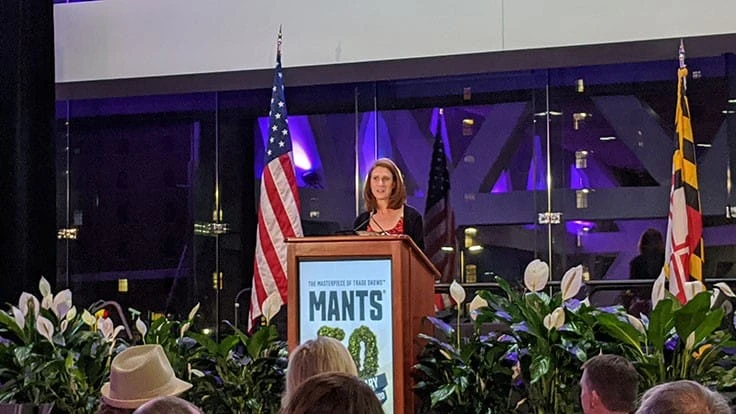 Vanessa Finney speaks to the attendees of the MANTS 50-year gala.