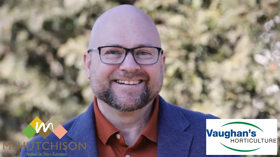 A smiling bald man with glasses and a short beard wearing a blue suit jacket and orange dress shirt. In the bottom left is a logo for McHutchison that reads Vested in Your Success. In the bottom right is a logo that reads Vaughan's Horticulture.