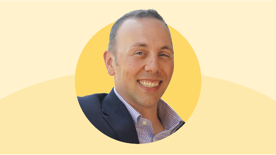 A circle headshot of a man in a suit. The photo is layered on top of a yellow background.