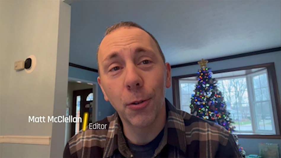 man with Christmas tree