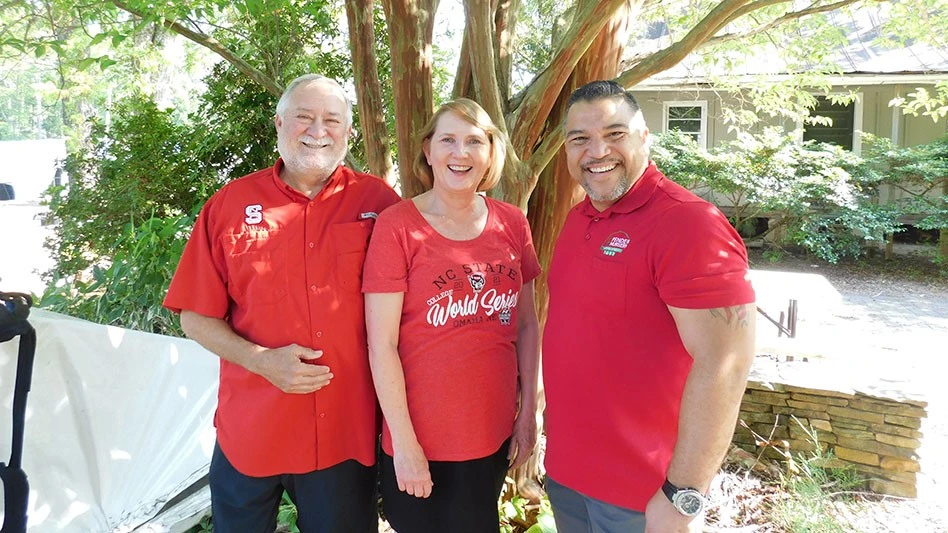 Ariel Montañez (right) with Pender Nursery co-owners Jim Deal and Kathy Deal.